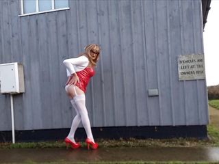 Tranny Outdoors Pissing in Red PVC Dress