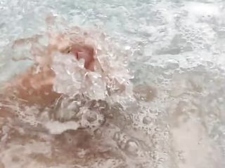 Young amateur playing with his dick in the jacuzzi