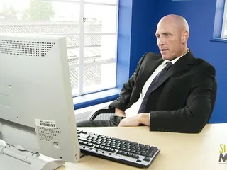 Bald dude fucking a blond secretary in the office