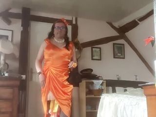 In orange dress