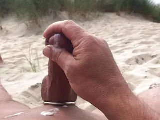 Caught masturbating and cumming on the beach