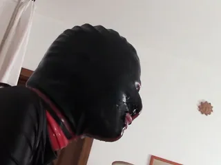 Teaser Laura hooded in a very close view of a great blowjob action with ring gag and huge cum swallow 