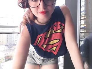 Supergirl Clothed flashing boobs in balcony