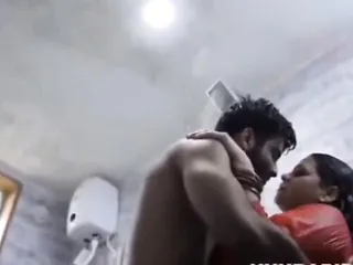 A young man having sex with neighbor&#039;s aunt in bathroom