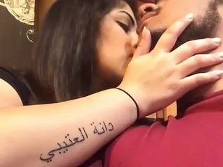 arabian couple kissing in public 