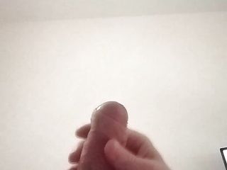 Guy jerking off uncircumcised cock on the table  #13