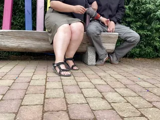 Mother-in-law jerks son-in-law&#039;s cock in a public park