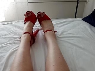 horny MILF translady talks in her sexy voice and shows off her red painted toes in her favorite red high heels