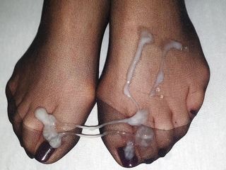 Slimy cumhot on black toes in black nylon socks