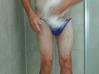 having a shower with my blue thong on