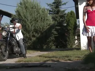 Biker stud spots a farm girl with her small tits out and stops for sex