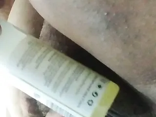 Bhabhi slapping hairy pussy and trying to enter oil bottle
