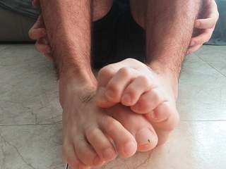 Hot guy massaging his feet. Foot fetish