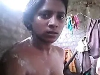 North indian housewife bathing