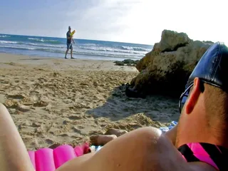 My wife gave her ass to a stranger on the beach during our summer vacation. She fucked him and me right there in public