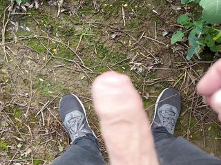 Outdoor wank and cum in a field