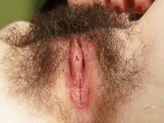Hairy Pussy Annabelle Lee rubs her pussy to make herself cum and orgasm all over the bed, then spreads her pussy open