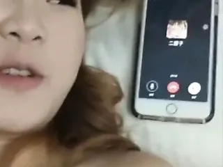 Talking on the phone with a friend, meanwhile Chinese gf is fucking
