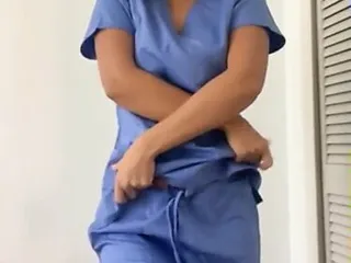 blonde nurse shows body