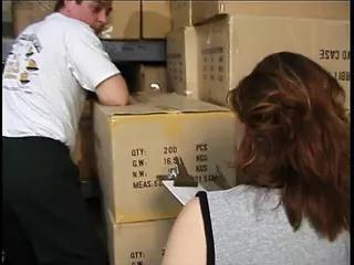Hairy MILF gets her pussy licked and fucked on boxes in warehouse
