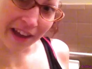 Goddess Amanda Peeing in the Toilet Wearing Glasses 