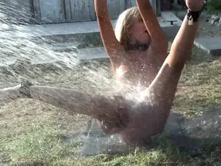 Sexy sub Bianca gets dominated with water humiliation by sadistic dude outdoors