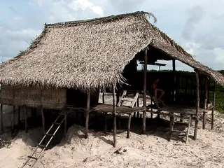 On an island two perverted couples fuck in an amateur beach house
