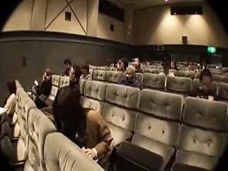Mischievous in a movie theater
