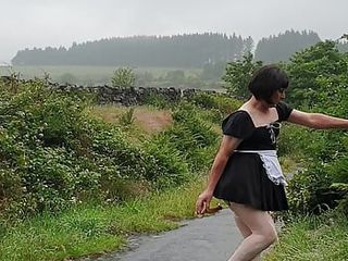 Crossdressing slut Maid on a public lane in the rain 
