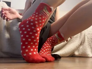 beautiful legs in socks dancing on the floor