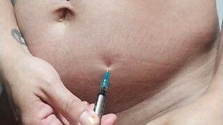 Ftm takes injection in cubby tummy