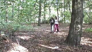 A sexy German slut gets a double cumshot in the middle of the woods