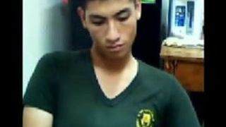 A cute Thai soldier shows his cock on cam.