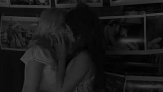 Scarlett Johansson kissing Penelope Cruz