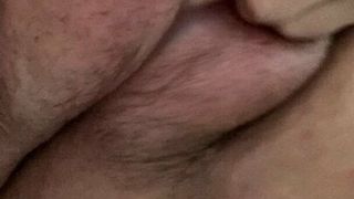Playing with my hairy, saline filled pussy lips