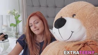 Ginger petite rides strapon teddy bear before riding cock