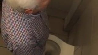 Old Greek man piss station