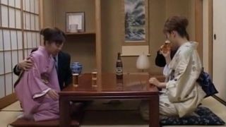 Japanese milfs sticks cock in her cunt next to other couple