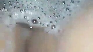 Teen girl masturbates in the bathtub