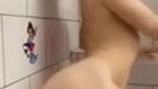Babe fucks her mounted dildo in shower