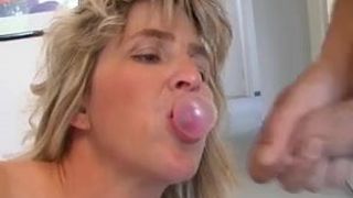 Blonde Mature takes cumshot with gum in your mouth