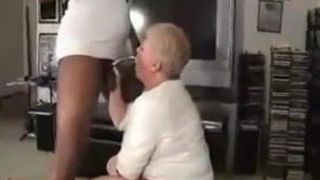 White granny makes a good fellatio to black cock