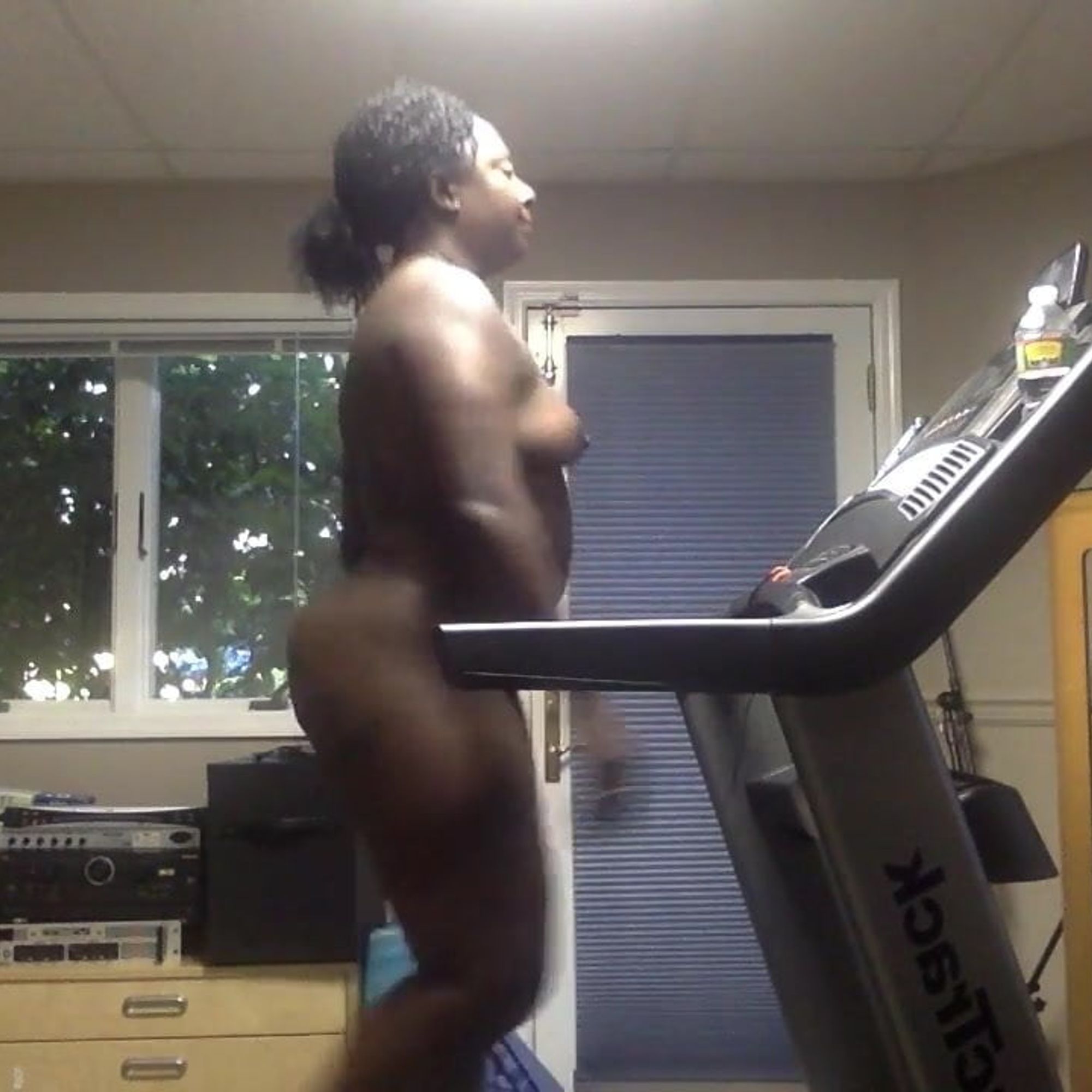 Ebony milf on treadmill