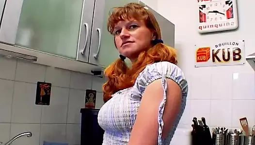 A curvy German babe gets her asshole smashed in the kitchen
