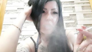 Smoking fetish from Dominatrix Nika.  How sexy and erotic is this smoking Mistress?