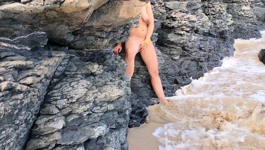 stepdad walks on the beach and meets naked stepdaughter masturbating peeps and comes up with a cock.