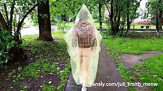 Girl in a raincoat flashing tits and ass on the city streets