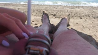 teasing in chastity on the beach