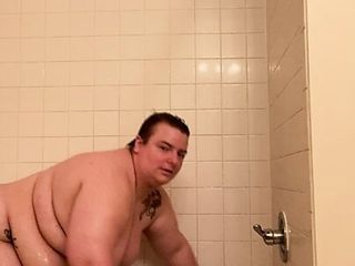 Showing fat belly in shower...