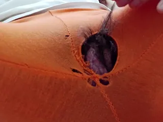  video: Indian girl working from home with hole in her pants. Under table view.
